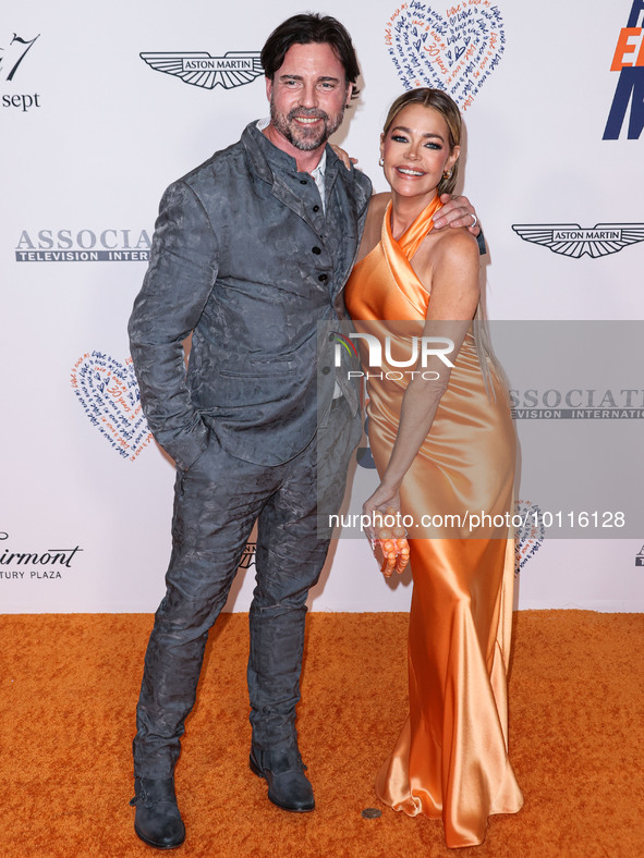 Aaron Phypers and wife Denise Richards arrive at the 30th Annual Race To Erase MS Gala held at the Fairmont Century Plaza on June 2, 2023 in...