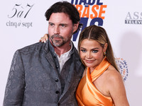 Aaron Phypers and wife Denise Richards arrive at the 30th Annual Race To Erase MS Gala held at the Fairmont Century Plaza on June 2, 2023 in...