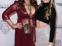 Joely Fisher and daughter True Fisher arrive at the 30th Annual Race To Erase MS Gala held at the Fairmont Century Plaza on June 2, 2023 in...