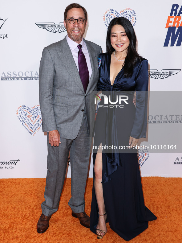 Rob Minkoff and wife Crystal Kung Minkoff arrive at the 30th Annual Race To Erase MS Gala held at the Fairmont Century Plaza on June 2, 2023...