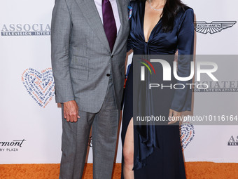 Rob Minkoff and wife Crystal Kung Minkoff arrive at the 30th Annual Race To Erase MS Gala held at the Fairmont Century Plaza on June 2, 2023...