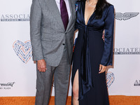 Rob Minkoff and wife Crystal Kung Minkoff arrive at the 30th Annual Race To Erase MS Gala held at the Fairmont Century Plaza on June 2, 2023...