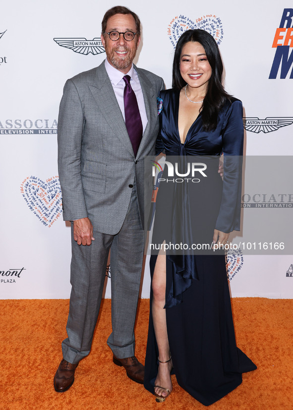 Rob Minkoff and wife Crystal Kung Minkoff arrive at the 30th Annual Race To Erase MS Gala held at the Fairmont Century Plaza on June 2, 2023...