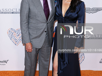 Rob Minkoff and wife Crystal Kung Minkoff arrive at the 30th Annual Race To Erase MS Gala held at the Fairmont Century Plaza on June 2, 2023...