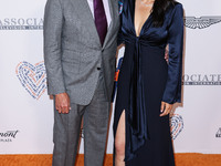 Rob Minkoff and wife Crystal Kung Minkoff arrive at the 30th Annual Race To Erase MS Gala held at the Fairmont Century Plaza on June 2, 2023...