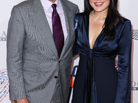 Rob Minkoff and wife Crystal Kung Minkoff arrive at the 30th Annual Race To Erase MS Gala held at the Fairmont Century Plaza on June 2, 2023...