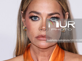 American actress, television personality and former fashion model Denise Richards arrives at the 30th Annual Race To Erase MS Gala held at t...