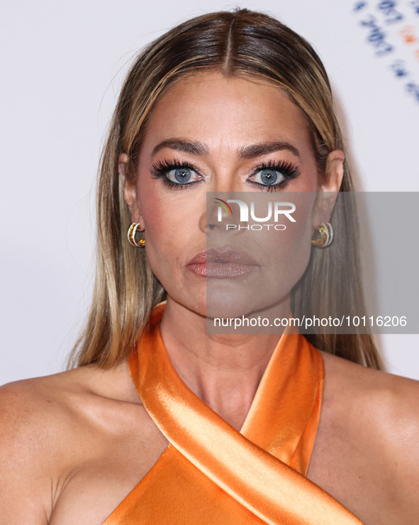 American actress, television personality and former fashion model Denise Richards arrives at the 30th Annual Race To Erase MS Gala held at t...