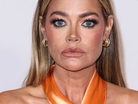 American actress, television personality and former fashion model Denise Richards arrives at the 30th Annual Race To Erase MS Gala held at t...