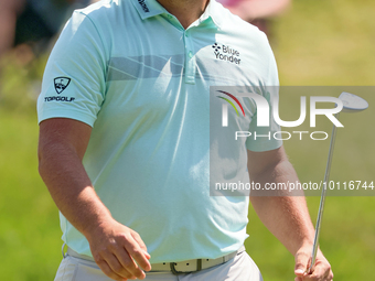 John Rahm of Barrika, Spain walks on the 9th green after making his putt during  The Memorial Tournament presented by Workday at Muirfield V...