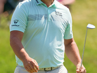 John Rahm of Barrika, Spain walks on the 9th green after making his putt during  The Memorial Tournament presented by Workday at Muirfield V...