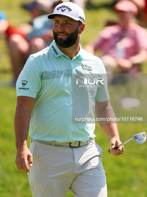 John Rahm of Barrika, Spain walks on the 9th green after making his putt during  The Memorial Tournament presented by Workday at Muirfield V...