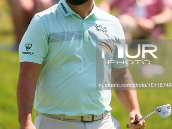 John Rahm of Barrika, Spain walks on the 9th green after making his putt during  The Memorial Tournament presented by Workday at Muirfield V...