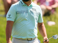 John Rahm of Barrika, Spain walks on the 9th green after making his putt during  The Memorial Tournament presented by Workday at Muirfield V...