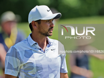 Jason Day of Brisbane, Australia looks over the 9th green during  The Memorial Tournament presented by Workday at Muirfield Village Golf Clu...