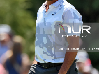 Jason Day of Brisbane, Australia walks on the 7th green during  The Memorial Tournament presented by Workday at Muirfield Village Golf Club...