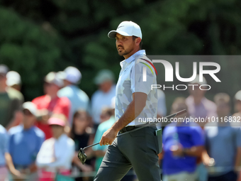 Jason Day of Brisbane, Australia walks on the 7th green during  The Memorial Tournament presented by Workday at Muirfield Village Golf Club...