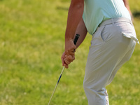 John Rahm of Barrika, Spain chips onto the 9th green during The Memorial Tournament presented by Workday at Muirfield Village Golf Club in D...