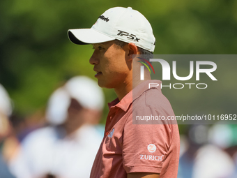 Collin Morikawa of La Canada, California looks over the 8th green during The Memorial Tournament presented by Workday at Muirfield Village G...