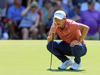 Collin Morikawa of La Canada, California lines up his putt on the 7th green during The Memorial Tournament presented by Workday at Muirfield...