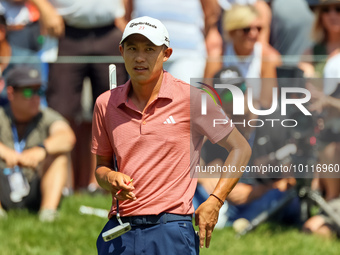 Collin Morikawa of La Canada, California waits on the 8th green during The Memorial Tournament presented by Workday at Muirfield Village Gol...