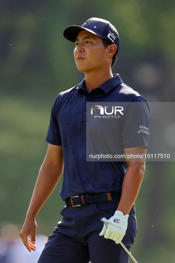 Justin Suh of San Jose, California follows his shot from the 18th fairway during the second round during  The Memorial Tournament presented...