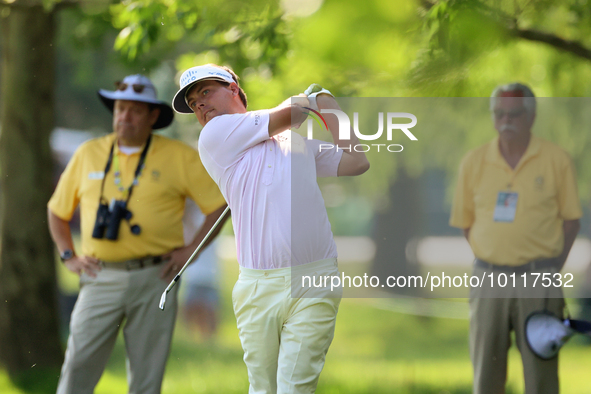 Keith Mitchell of St. Simons Island, Georgia hits from the rough on the 18th fairway during the second round during  The Memorial Tournament...