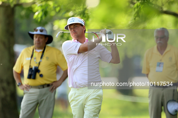 Keith Mitchell of St. Simons Island, Georgia hits from the rough on the 18th fairway during the second round during  The Memorial Tournament...