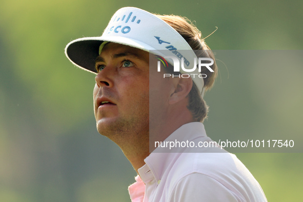 Keith Mitchell of St. Simons Island, Georgia follows his shot from the 18th fairway during the second round during The Memorial Tournament p...