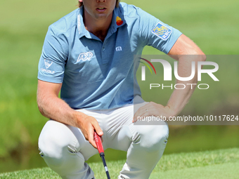 Sam Burns of Shreveport, Louisiana lines up his putt on the 10th green during The Memorial Tournament presented by Workday at Muirfield Vill...