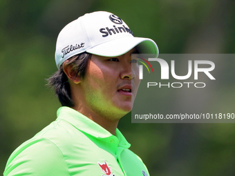 S.H. Kim walks on the 18th green during The Memorial Tournament presented by Workday at Muirfield Village Golf Club in Dublin, Ohio, USA, on...