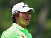 S.H. Kim walks on the 18th green during The Memorial Tournament presented by Workday at Muirfield Village Golf Club in Dublin, Ohio, USA, on...