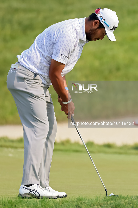 Hideki Matsuyama of Sendai, Japan putts on the 18th green during The Memorial Tournament presented by Workday at Muirfield Village Golf Club...