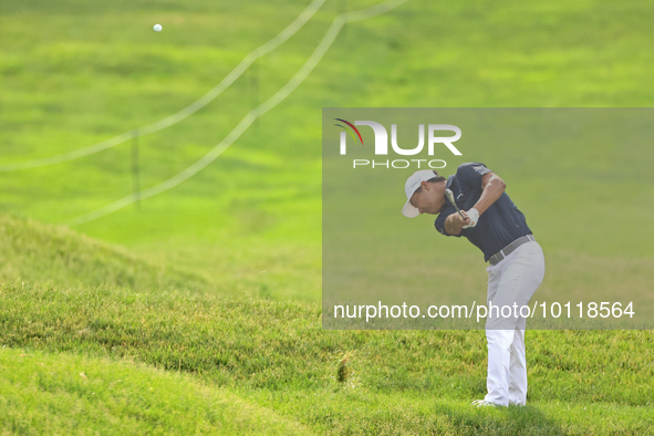 Justin Suh of San Jose, California hits from the 18th fairway during The Memorial Tournament presented by Workday at Muirfield Village Golf...