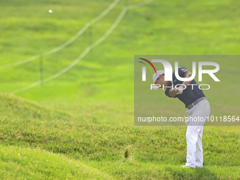 Justin Suh of San Jose, California hits from the 18th fairway during The Memorial Tournament presented by Workday at Muirfield Village Golf...