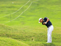 Justin Suh of San Jose, California hits from the 18th fairway during The Memorial Tournament presented by Workday at Muirfield Village Golf...