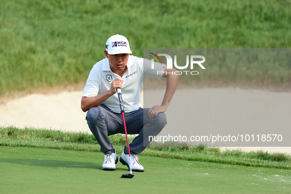 David Lipsky of Las Vegas, Nevada lines up his putt on the 18th green during The Memorial Tournament presented by Workday at Muirfield Villa...