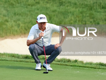 David Lipsky of Las Vegas, Nevada lines up his putt on the 18th green during The Memorial Tournament presented by Workday at Muirfield Villa...