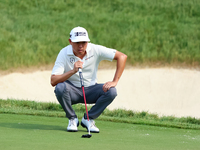 David Lipsky of Las Vegas, Nevada lines up his putt on the 18th green during The Memorial Tournament presented by Workday at Muirfield Villa...