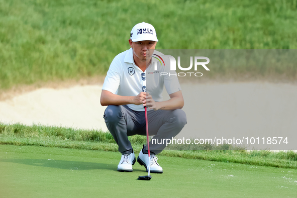 David Lipsky of Las Vegas, Nevada lines up his putt on the 18th green during The Memorial Tournament presented by Workday at Muirfield Villa...