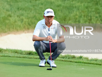 David Lipsky of Las Vegas, Nevada lines up his putt on the 18th green during The Memorial Tournament presented by Workday at Muirfield Villa...