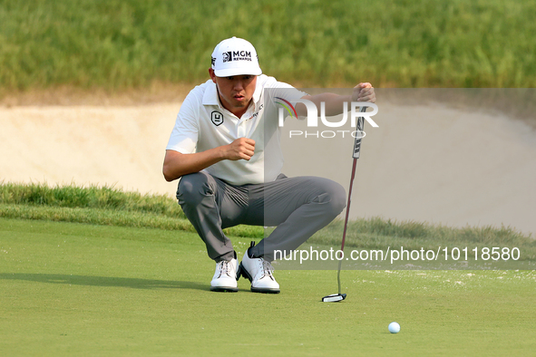 David Lipsky of Las Vegas, Nevada lines up his putt on the 18th green during The Memorial Tournament presented by Workday at Muirfield Villa...