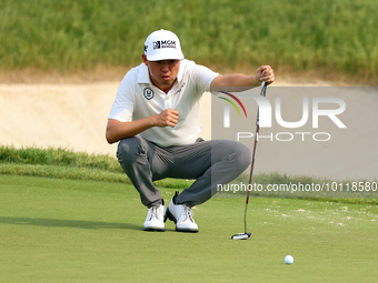 David Lipsky of Las Vegas, Nevada lines up his putt on the 18th green during The Memorial Tournament presented by Workday at Muirfield Villa...