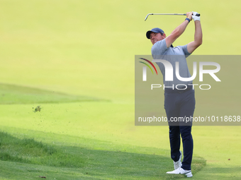 Rory McIlroy of Holywood, Northern Ireland hits from the 18th fairway during The Memorial Tournament presented by Workday at Muirfield Villa...