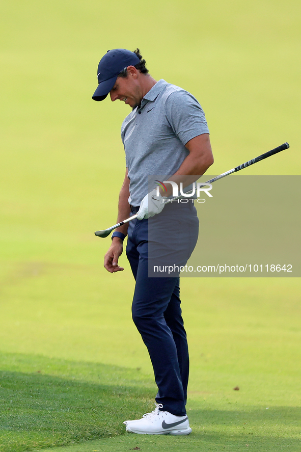 Rory McIlroy of Holywood, Northern Ireland reacts after hitting from the 18th fairway during The Memorial Tournament presented by Workday at...