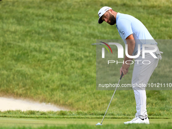 Jon Rahm of Barrika, Spain putts on the 18th green during The Memorial Tournament presented by Workday at Muirfield Village Golf Club in Dub...