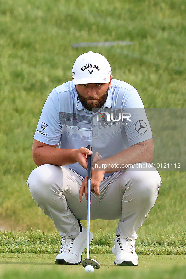 Jon Rahm of Barrika, Spain lines up his putt on the 18th green during The Memorial Tournament presented by Workday at Muirfield Village Golf...