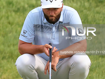 Jon Rahm of Barrika, Spain lines up his putt on the 18th green during The Memorial Tournament presented by Workday at Muirfield Village Golf...