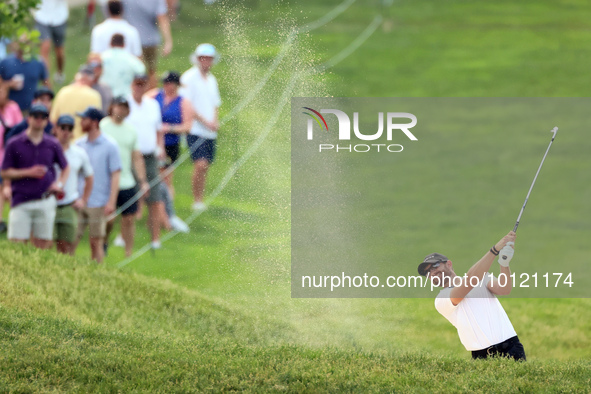 Patrick Rodgers of Jupiter, Florida hits from the 18th fairway during The Memorial Tournament presented by Workday at Muirfield Village Golf...