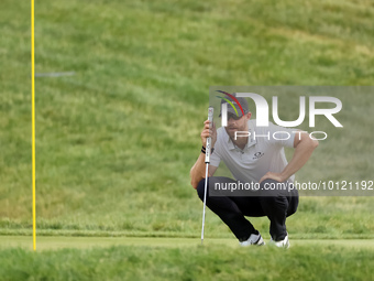 Patrick Rodgers of Jupiter, Florida lines up his putt on the 1th green during The Memorial Tournament presented by Workday at Muirfield Vill...